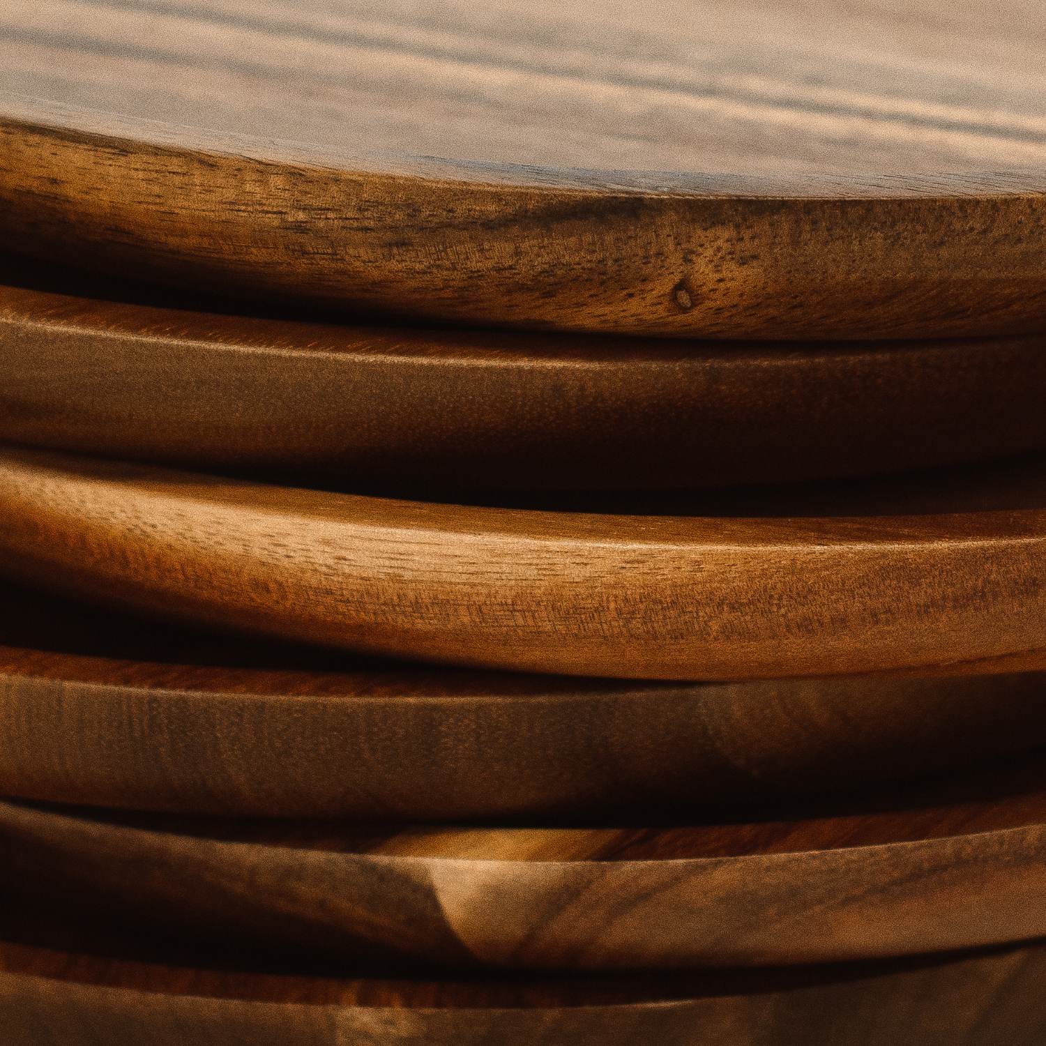Stacked acacia wood plates